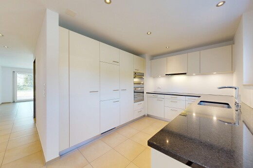 kitchen with white cabinetry, modern cabinets, and recessed lighting