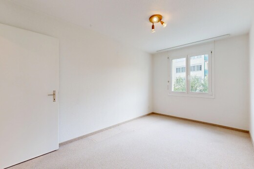 pièce vide avec drywall, cloison sèche, carpet, moquette, et inside property
