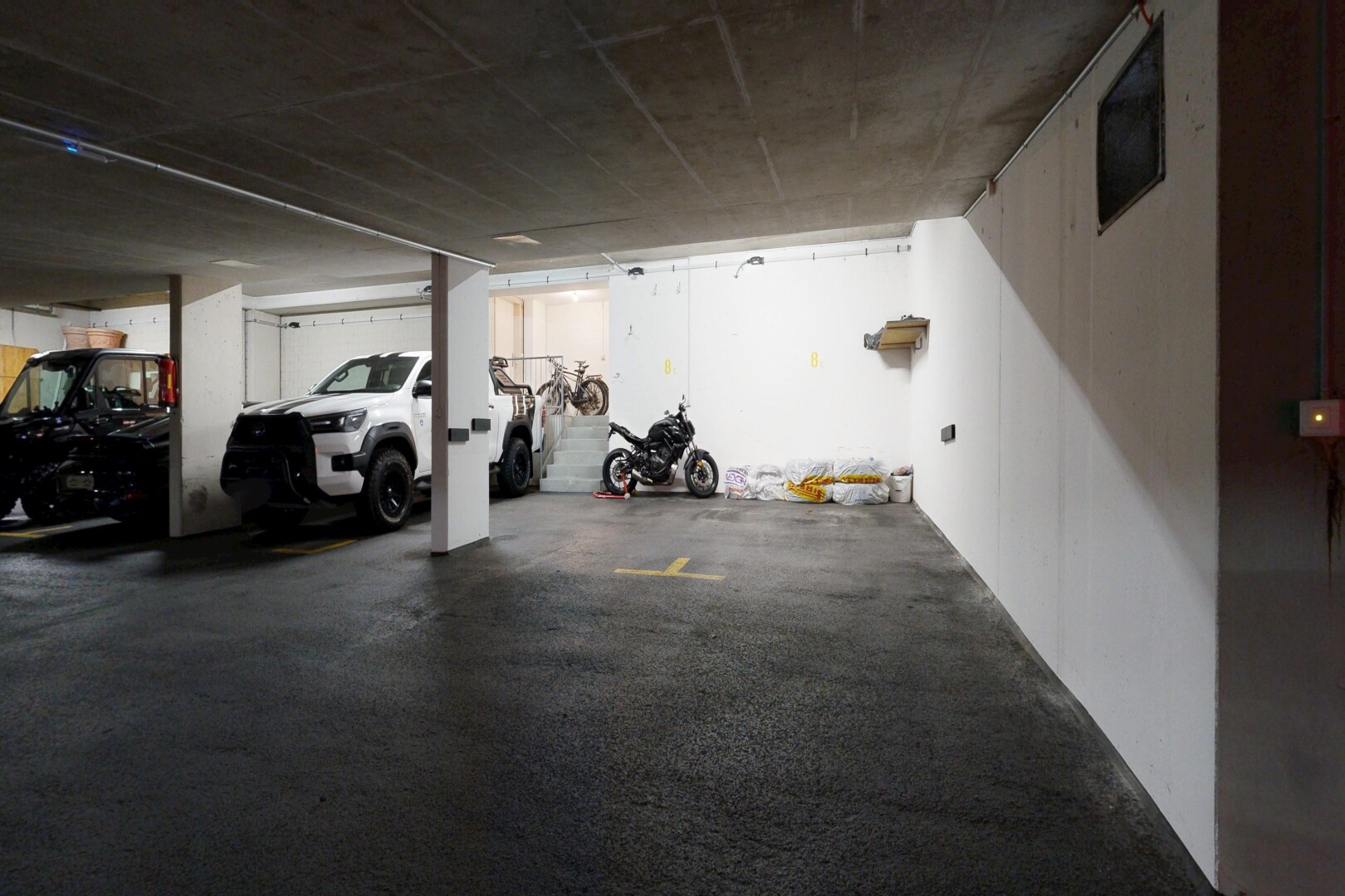 exercise room with a garage