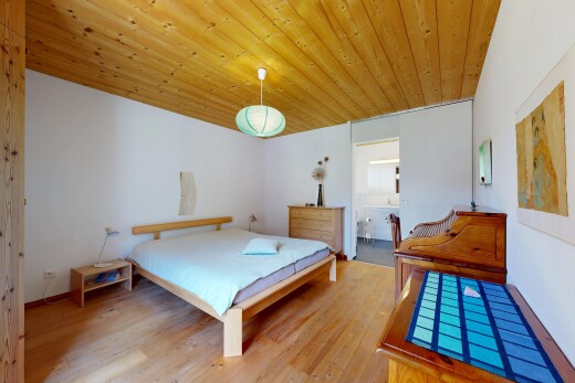 room / bedroom with light wood-type flooring and wooden ceiling