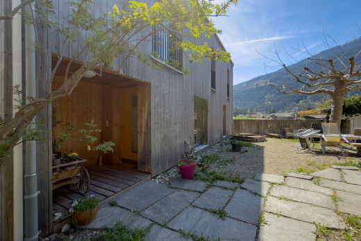 terrace featuring a mountain view and a patio