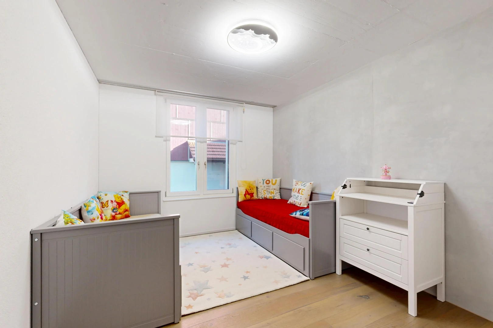 room / bedroom with light wood finished floors