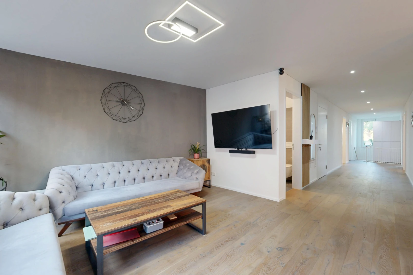 living room with recessed lighting and light wood finished floors