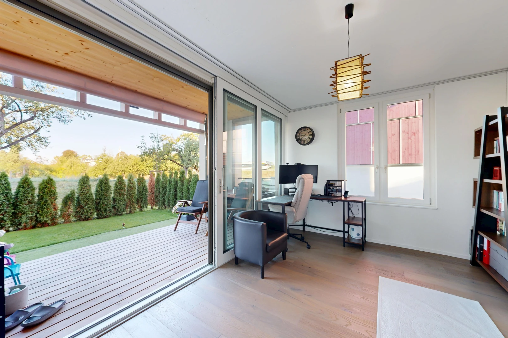 home office with access to exterior and wood finished floors