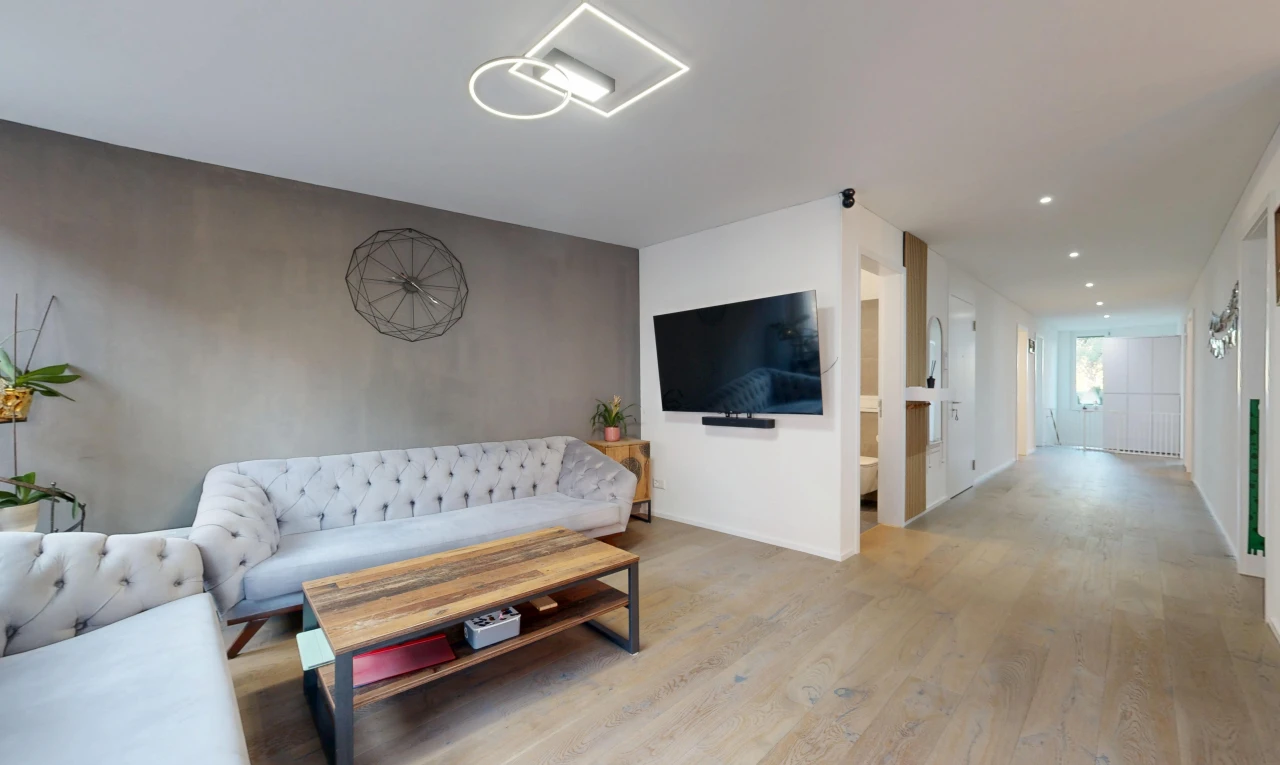 living room with recessed lighting and light wood finished floors