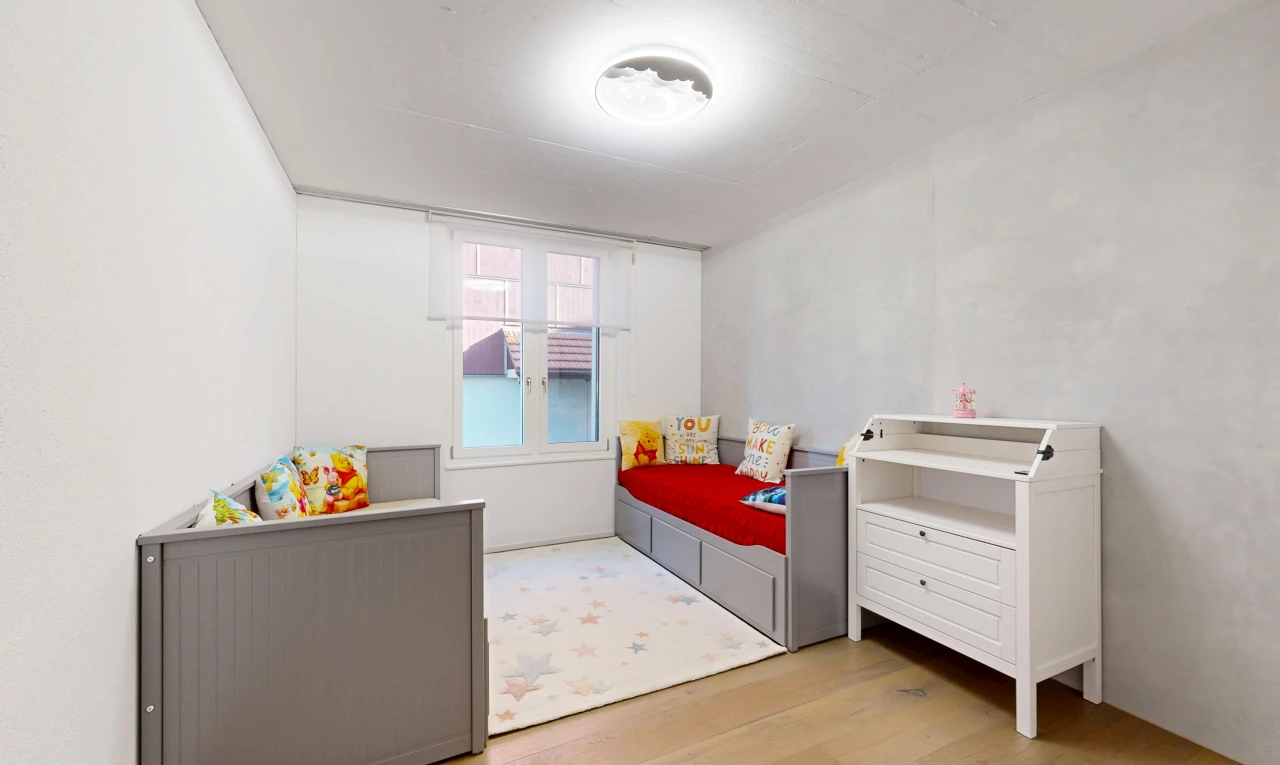 room / bedroom with light wood finished floors