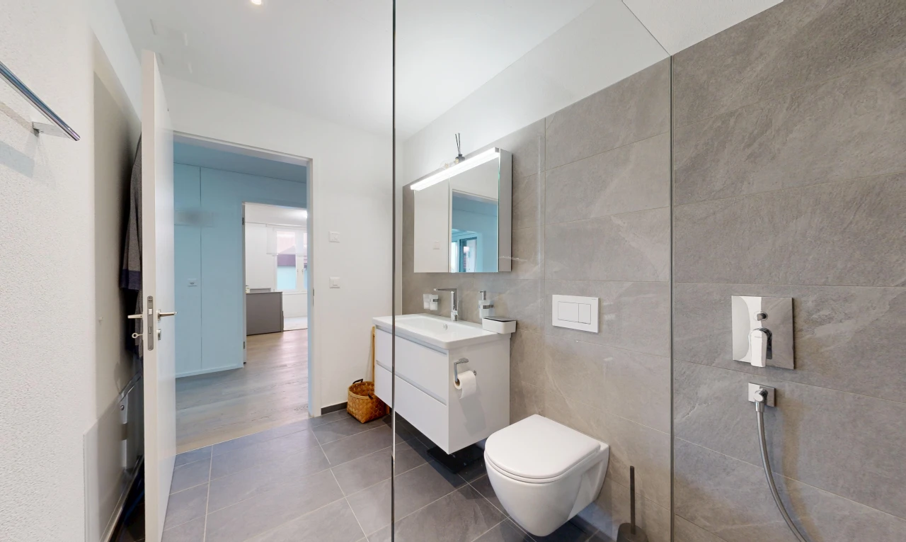 bathroom featuring vanity, tile walls, and tile patterned floors