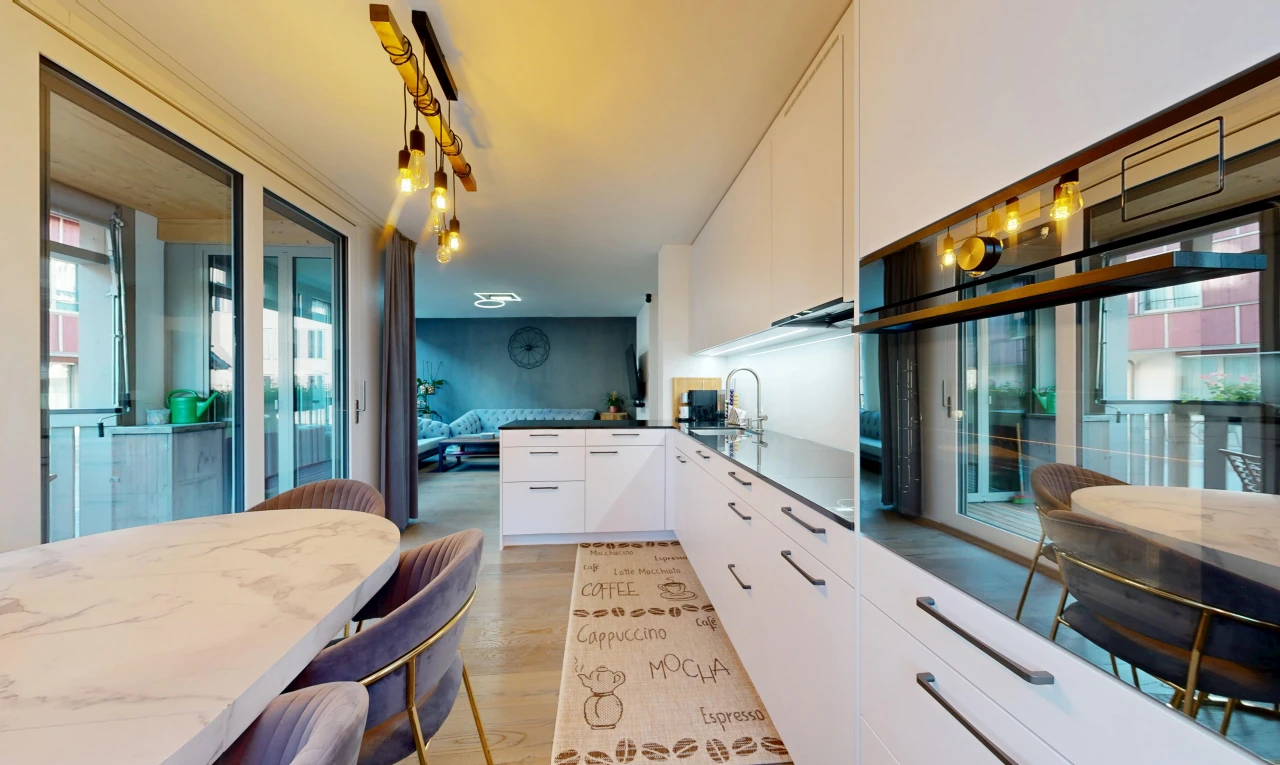 kitchen with oven, access to outside, a peninsula, white cabinetry, and light wood finished floors