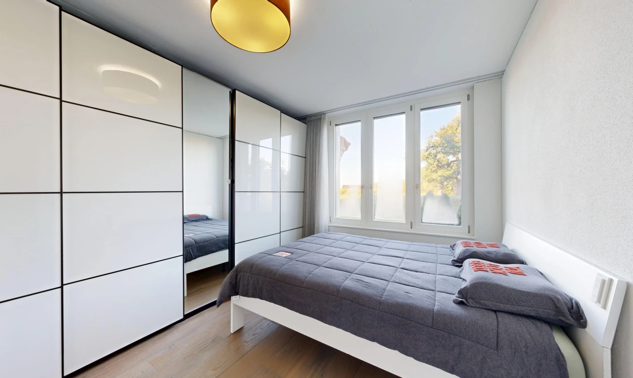 room with light wood-type flooring
