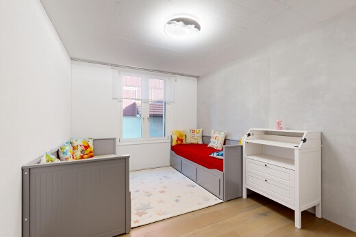 chambre avec sol en finition bois, wood finish floor, et inside property