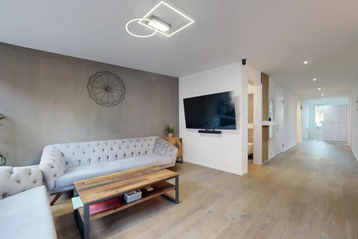 living room with recessed lighting and light wood finished floors