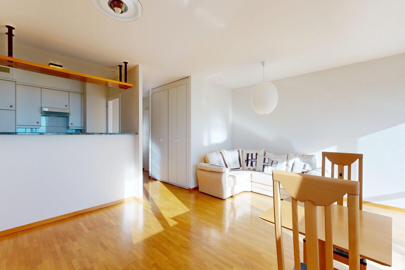 living / dining room with light wood-style floors