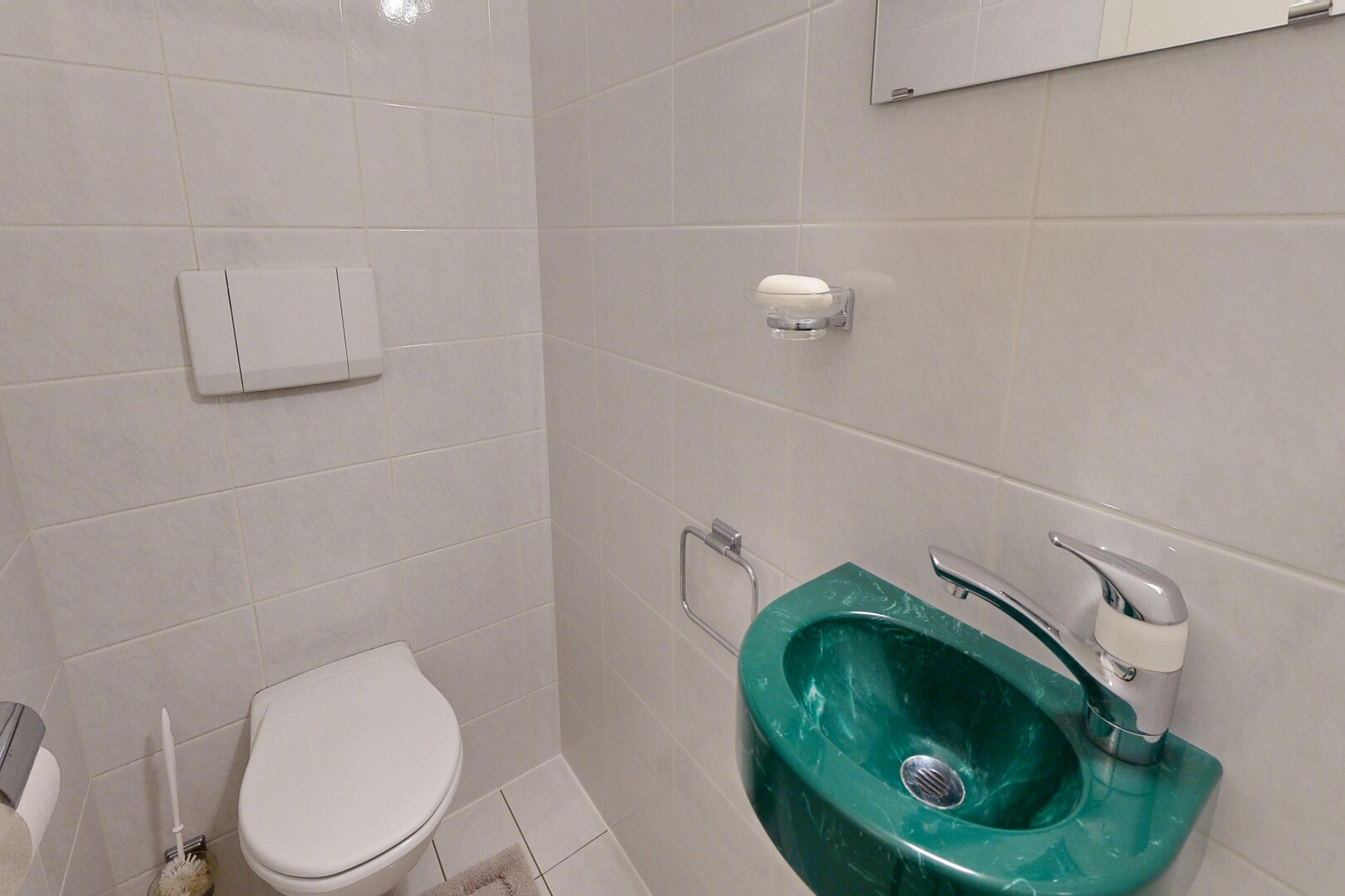 bathroom featuring tile walls and light tile patterned floors