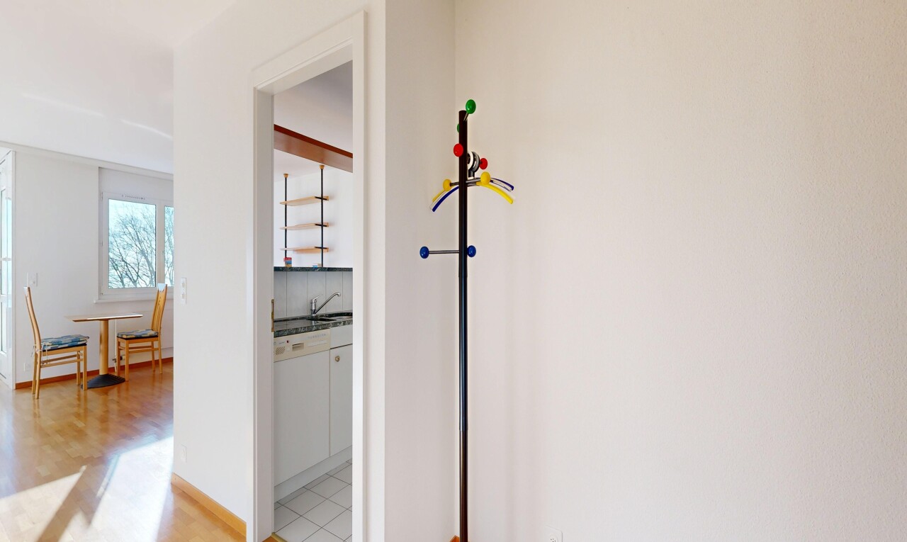 corridor featuring a sink