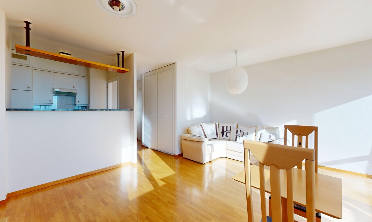 living / dining room with light wood-style floors