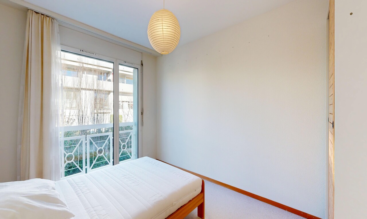 room featuring carpet flooring and access to outside