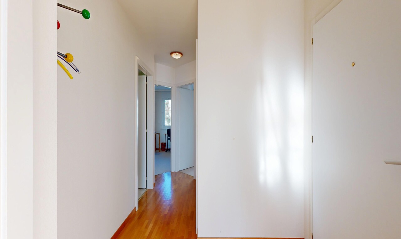 hallway featuring light wood finished floors