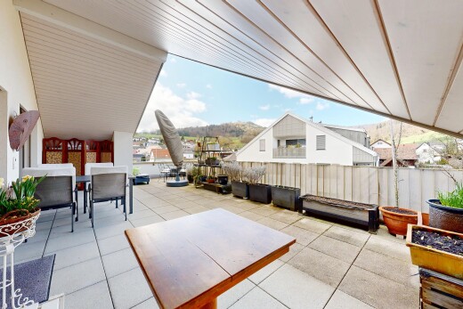 terrace featuring outdoor dining area and a patio area