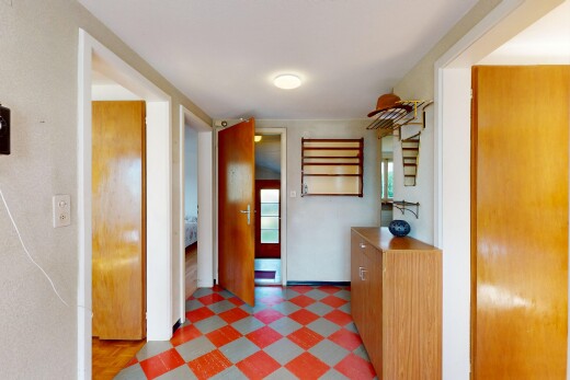 hall featuring tile patterned floors