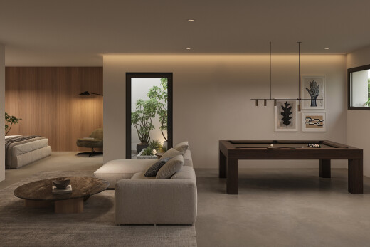 living room with concrete floors, wooden walls, and pool table