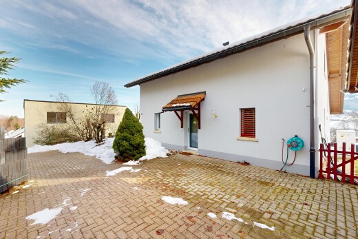 snow covered terrace with a patio area