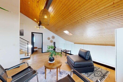 reception / lobby with vaulted ceiling, wood ceiling, and stairway