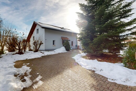 view of snow covered house