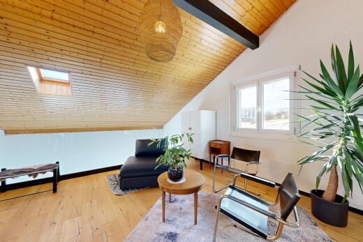 living area with hardwood / wood-style flooring, wood ceiling, and a skylight