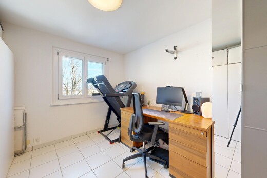 office area with light tile patterned floors