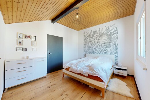 room / bedroom featuring light wood finished floors and wood ceiling