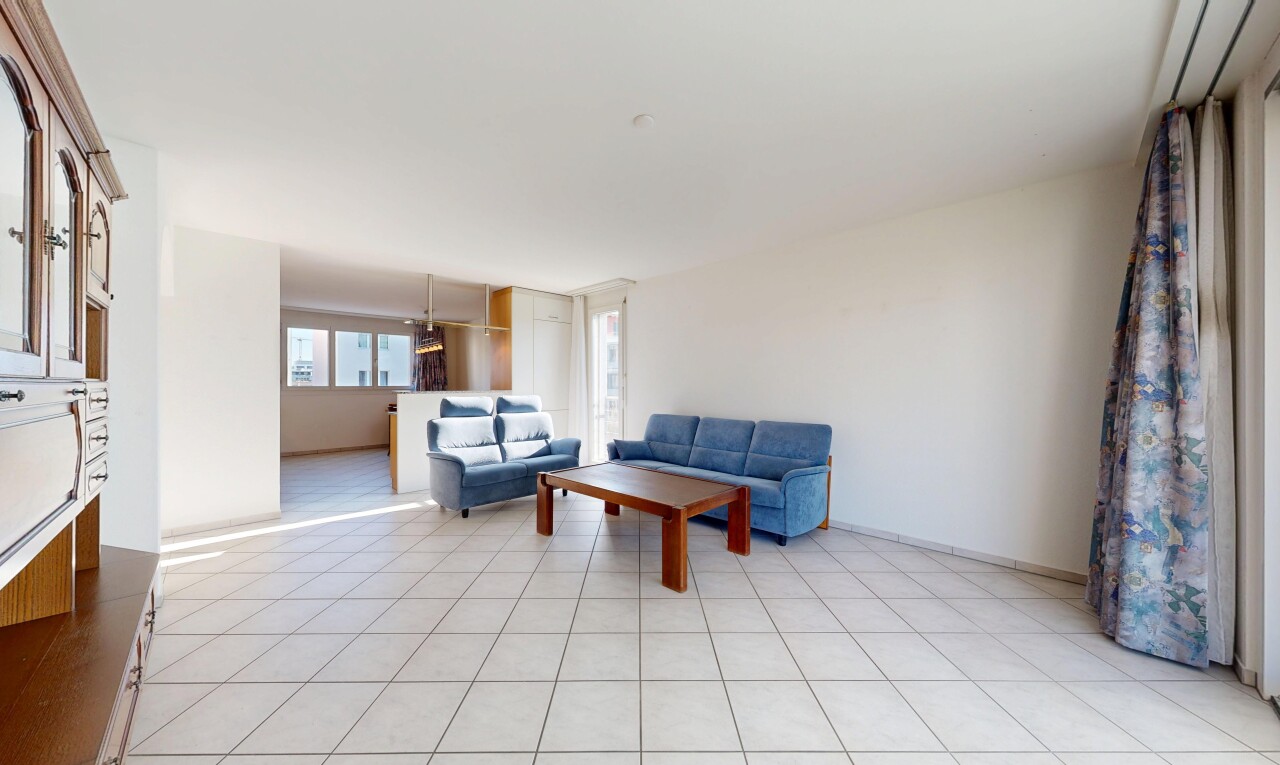living room featuring baseboards
