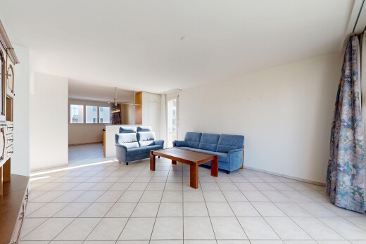 living room featuring baseboards