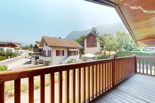 balcony featuring a mountain view and a residential view