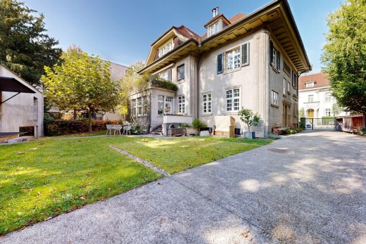 außenansicht mit dachgaube, day time, rasen, und stuckverkleidung