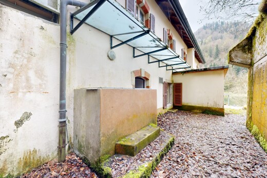 façade avec overcast, bardage en stuc, et from property