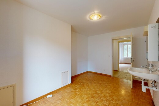 pièce vide avec parquet floor, cloison sèche, drywall, inside property, et sol en finition bois