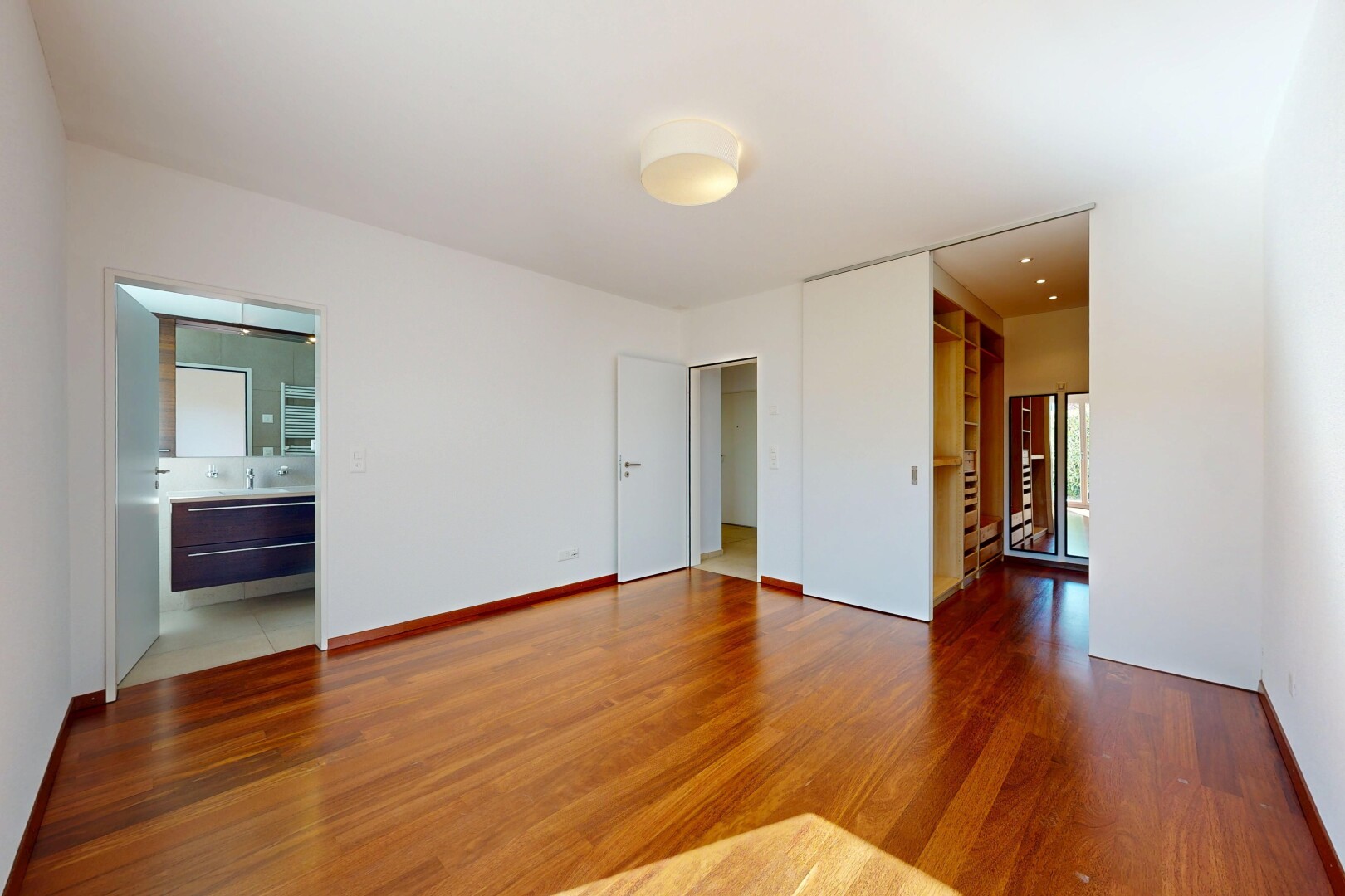 empty room featuring wood finished floors