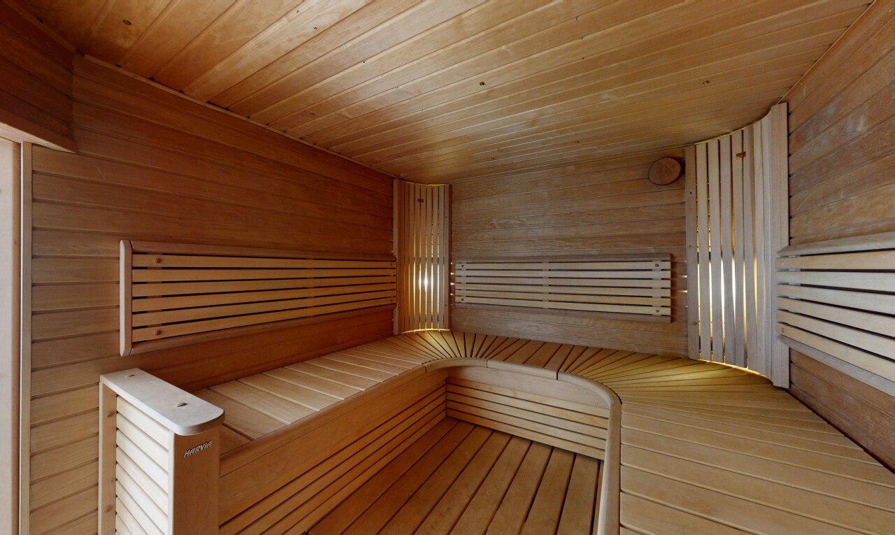 detailed view of a sauna, wooden ceiling, and wood walls