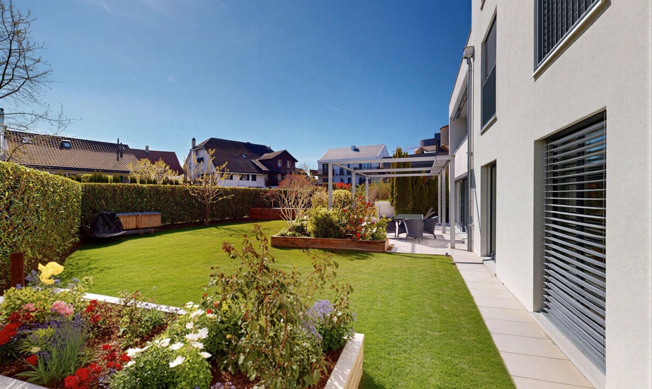 garden featuring a fenced backyard and a patio area