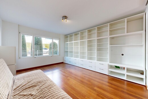 unfurnished room with light wood-style flooring and baseboards