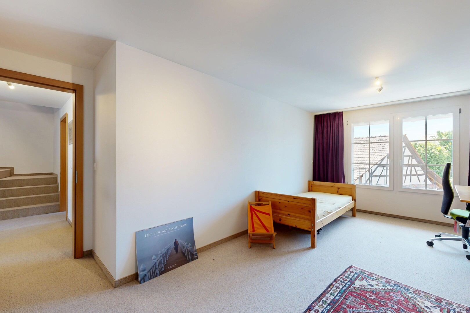 chambre avec moquette, carpet, cloison sèche, drywall, et inside property