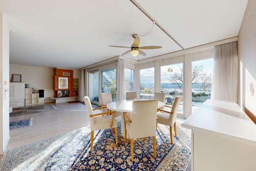 dining area featuring ceiling fan and light wood-style flooring