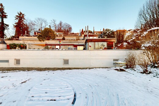 view of snow covered house