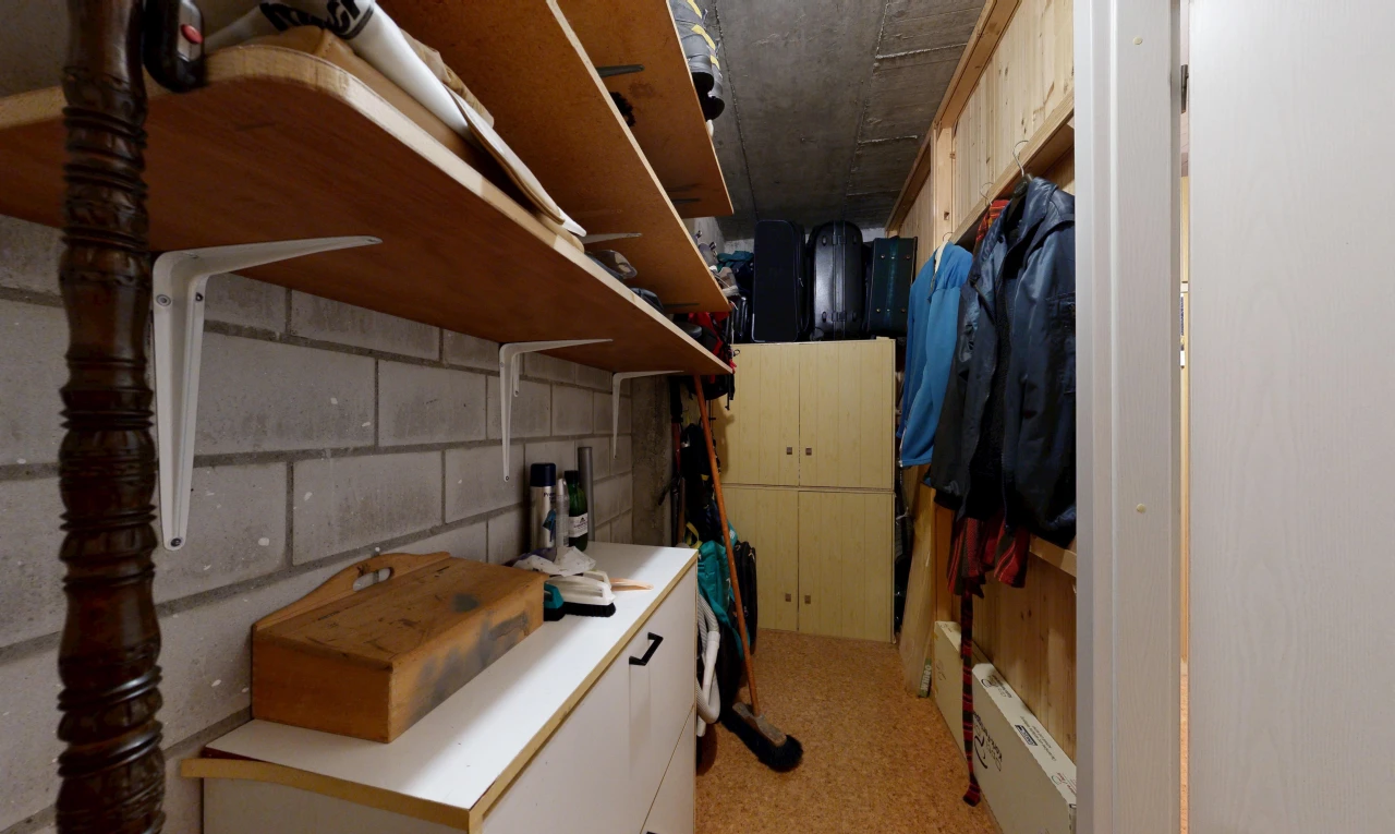 kitchen featuring concrete block wall