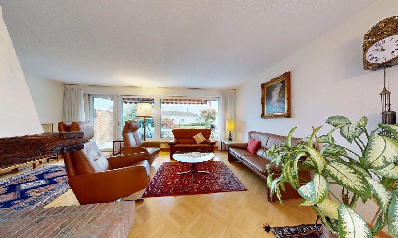 living area with access to outside and parquet floors