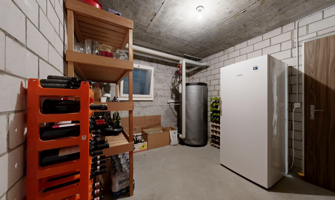 storage room with water heater