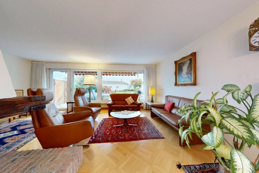 living area with access to outside and parquet floors
