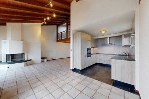 küche mit balkendecke, beamed ceiling, dark countertops, arbeitsplatten, und opens to living area