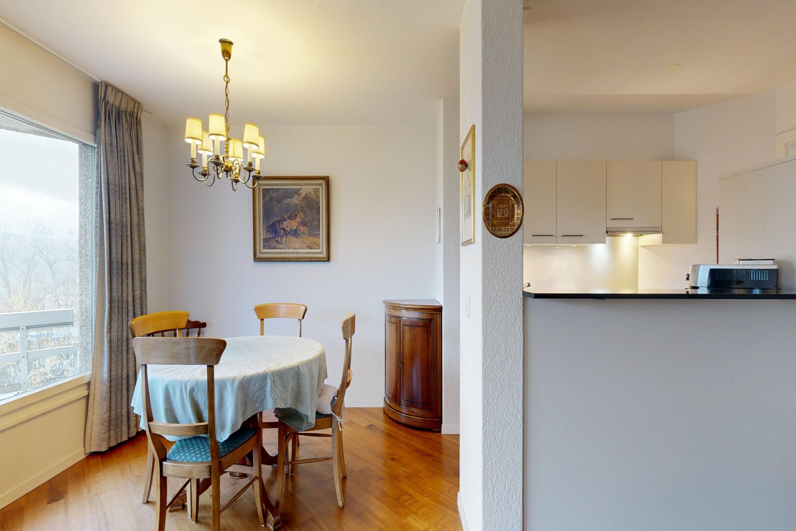 dining area featuring a chandelier and wood finished floors