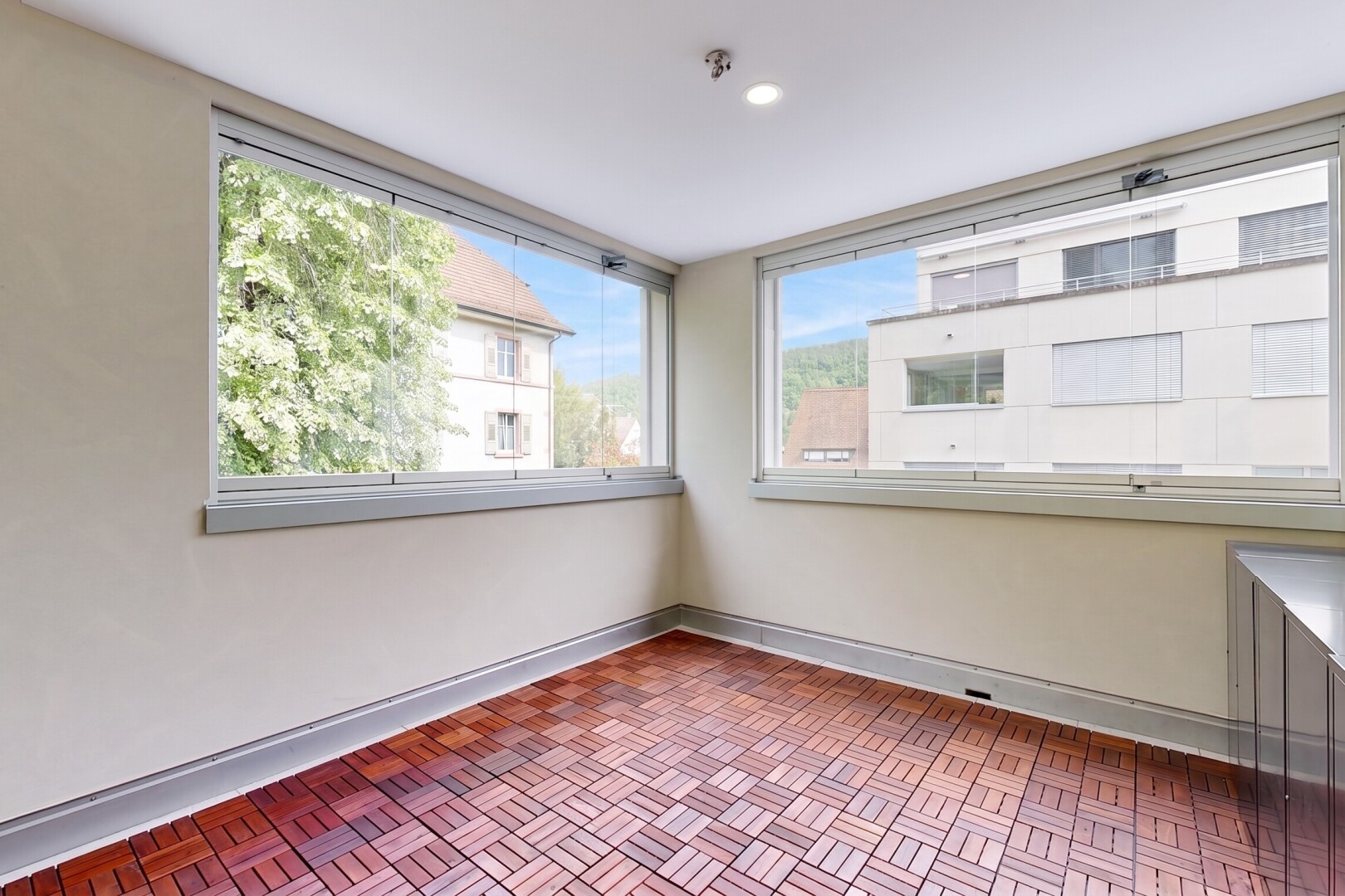 spare room with baseboards and recessed lighting